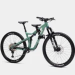 green full suspension bike with a small kids seat attachment on the top tube